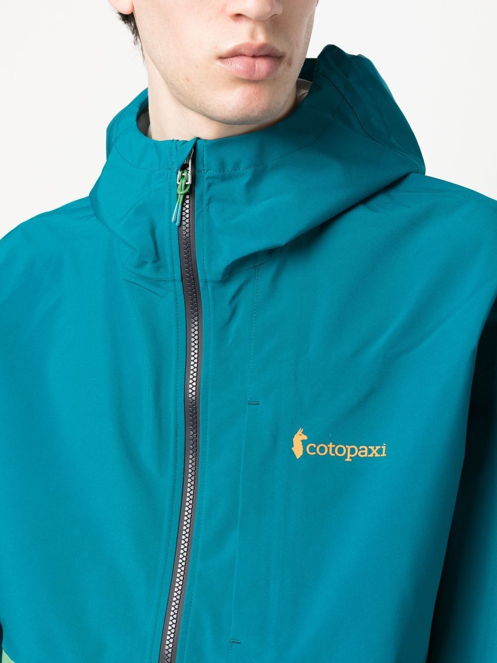 معاطف كوتوباكسي COTOPAXI باللون الأزرق الشفاف