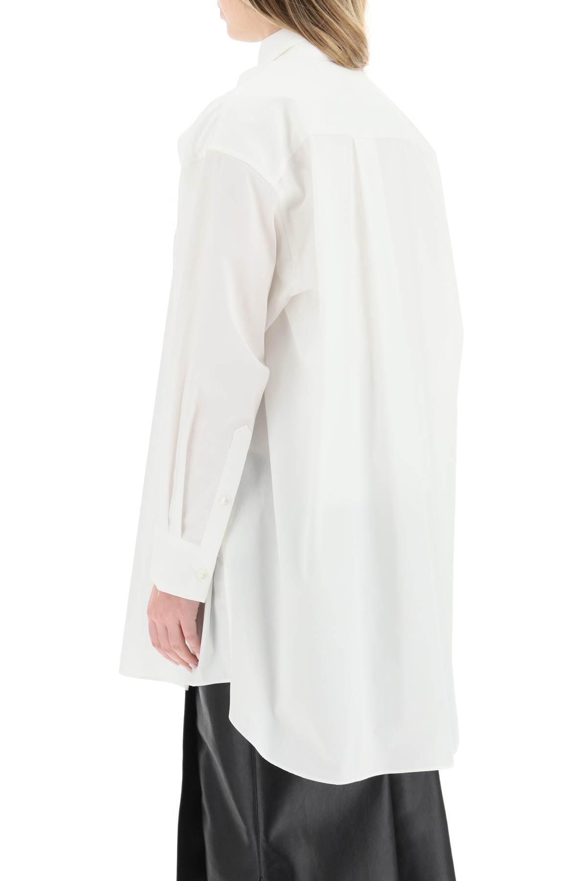 Sacai Sacai maxi shirt with cut-out sleeves