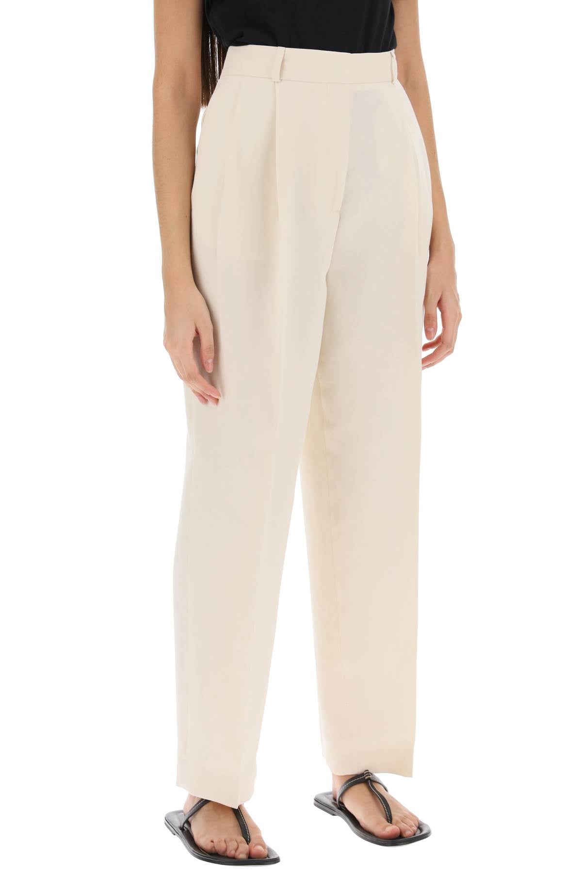 Toteme Toteme double-pleated viscose trousers