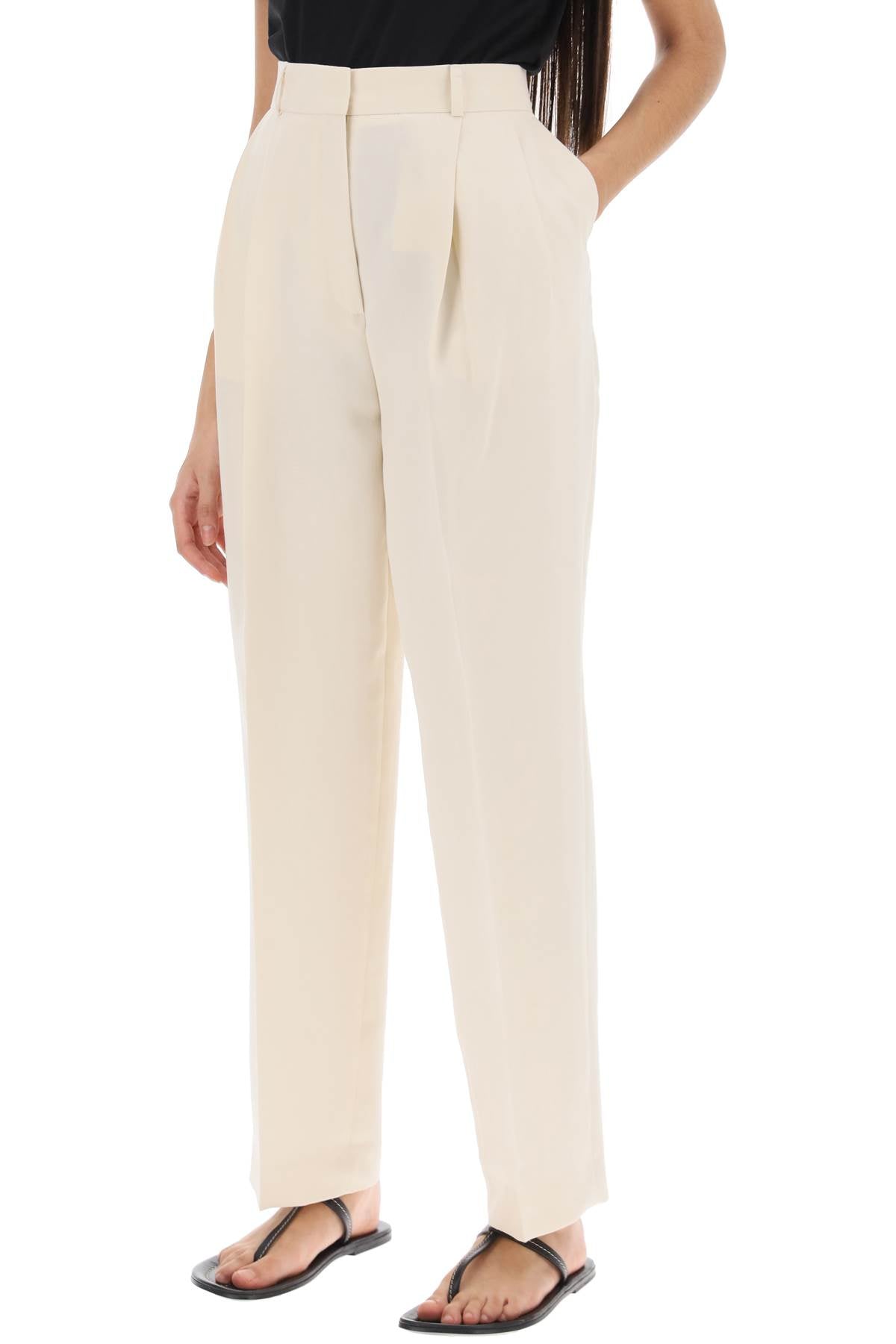 Toteme Toteme double-pleated viscose trousers