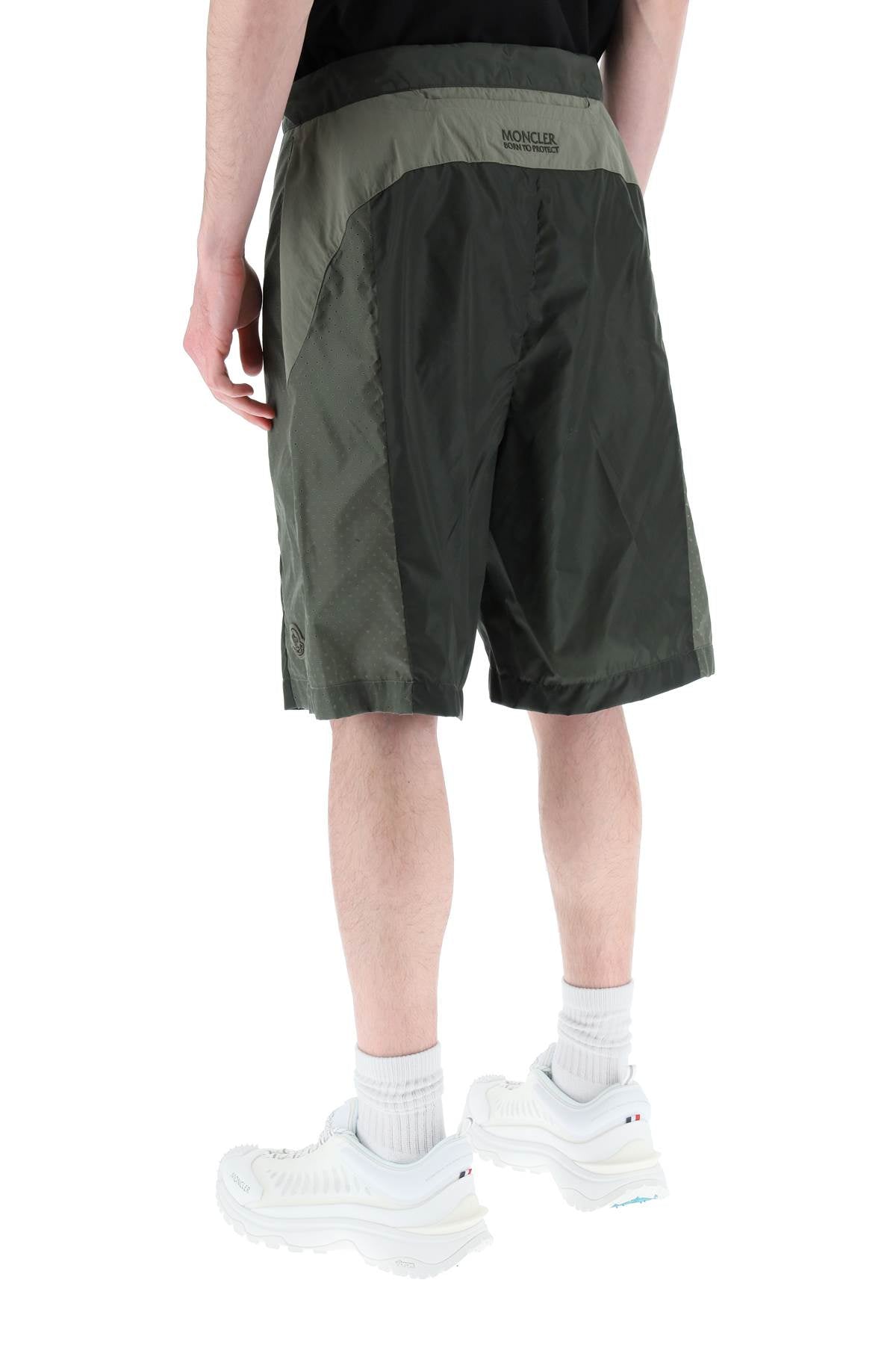 Moncler BORN TO PROTECT Moncler born to protect perforated nylon shorts