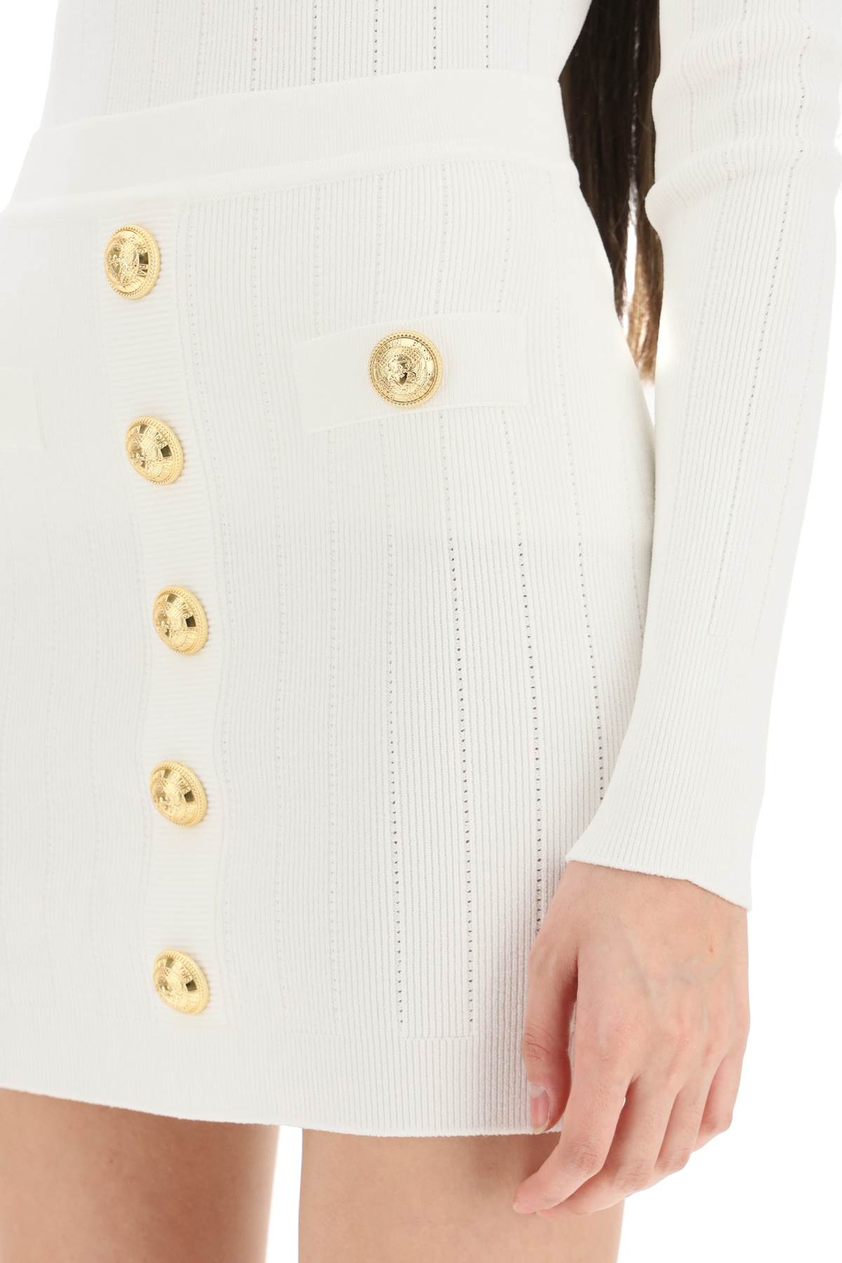 Balmain Balmain knit mini skirt with embossed buttons