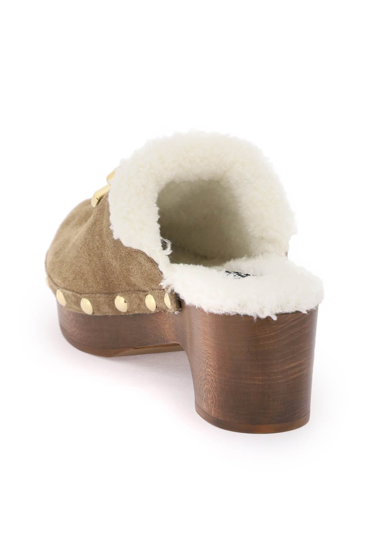 Dolce & Gabbana Dolce & gabbana suede and faux fur clogs with dg logo.