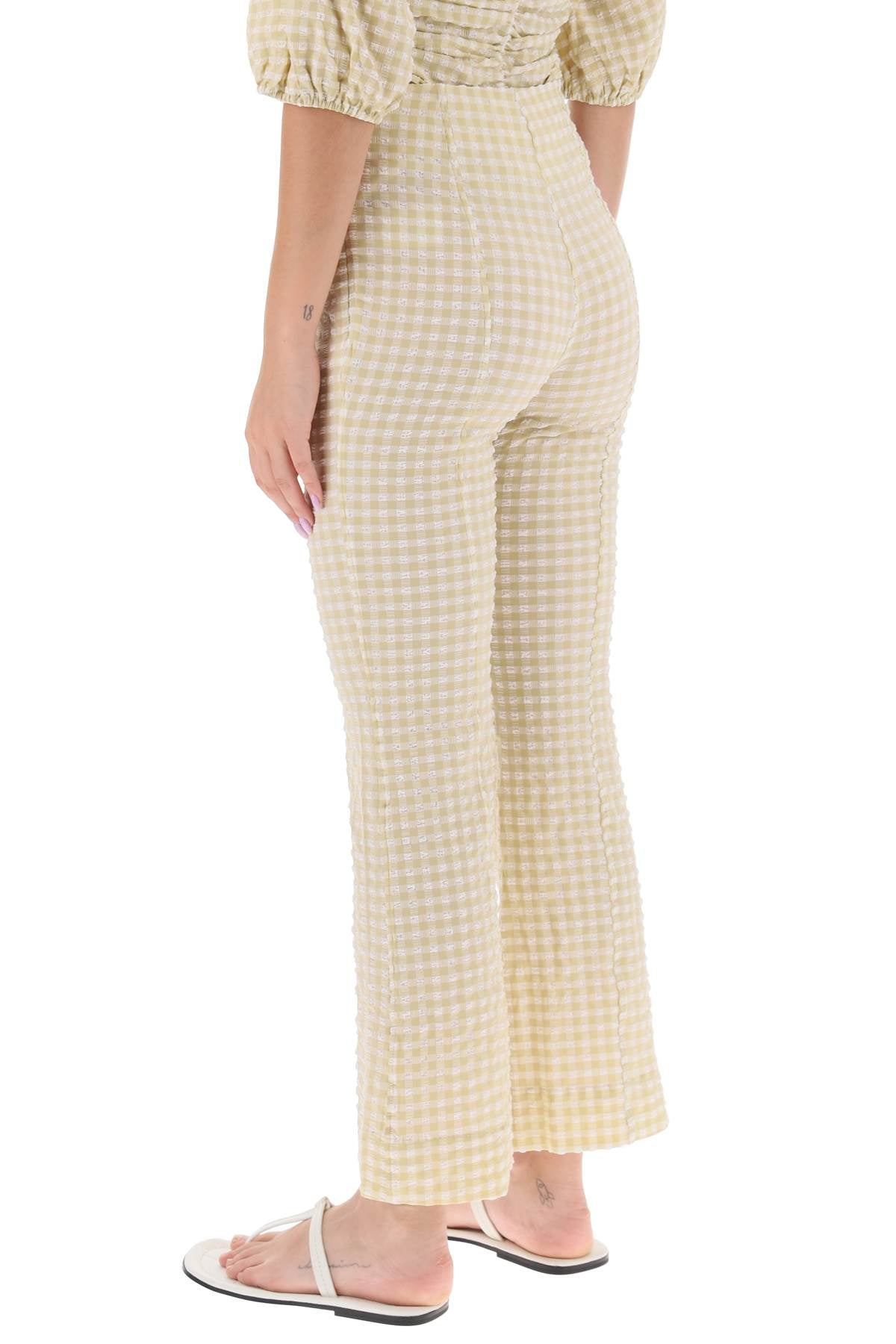 Ganni Ganni flared pants with gingham motif