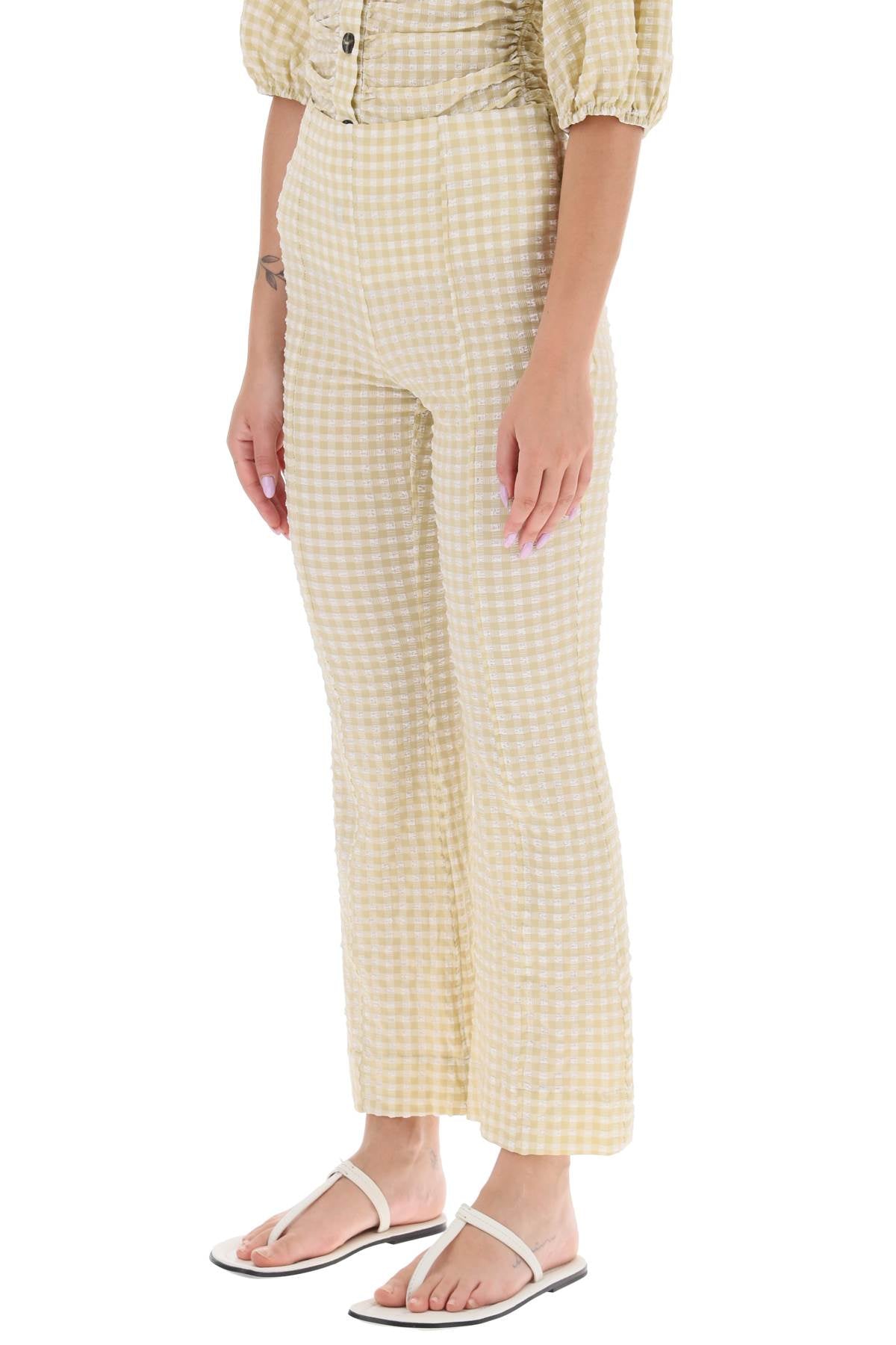 Ganni Ganni flared pants with gingham motif