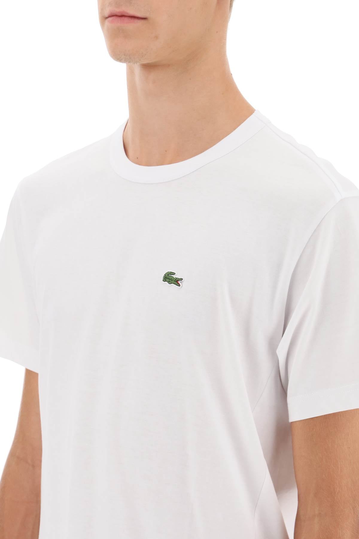 Comme Des Garcons Shirt Comme des garcons shirt x lacoste asymmetrical t-shirt